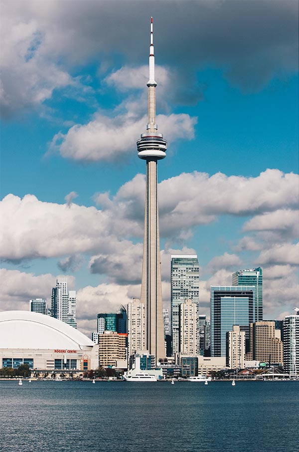 Photo of Toronto skyline from waterfront with CN tower, Rogers Centre and other recognizable landmarks
