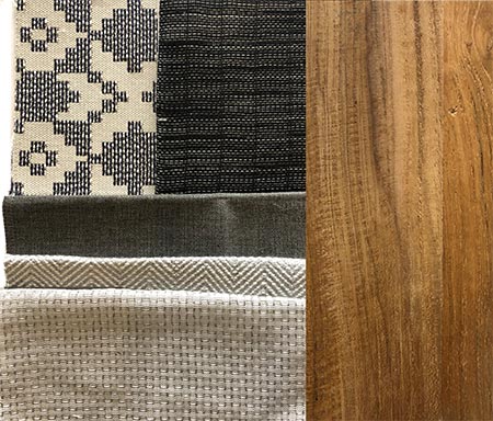 Photo of textile and material swatches including fabrics and woodgrain