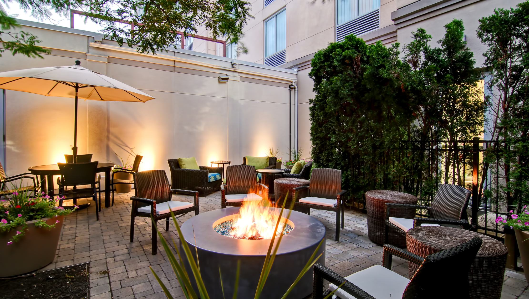 Photo of exterior patio with fire pit
